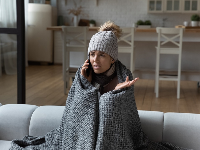 Cold woman calling on phone