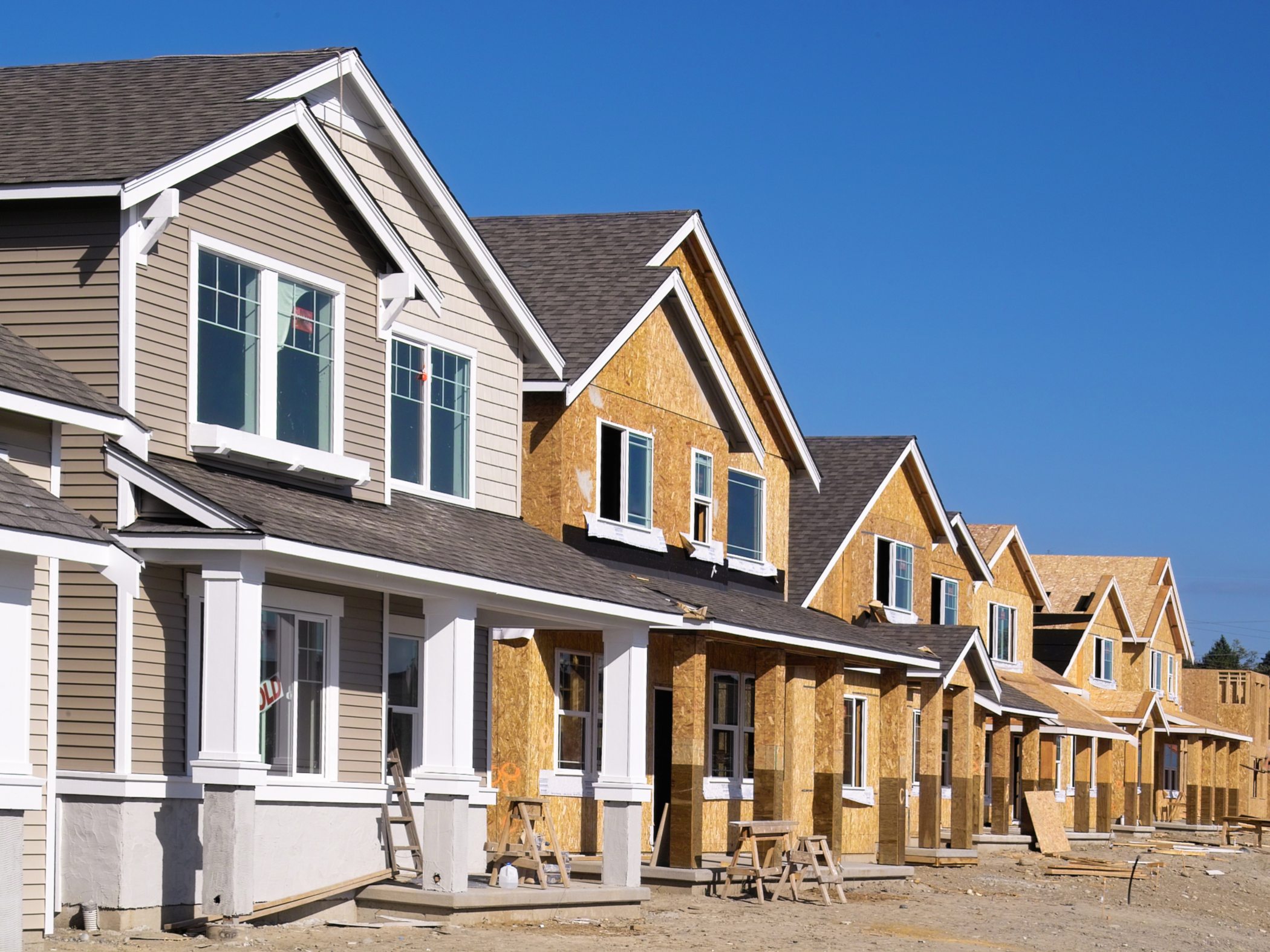 Row of new homes under construction