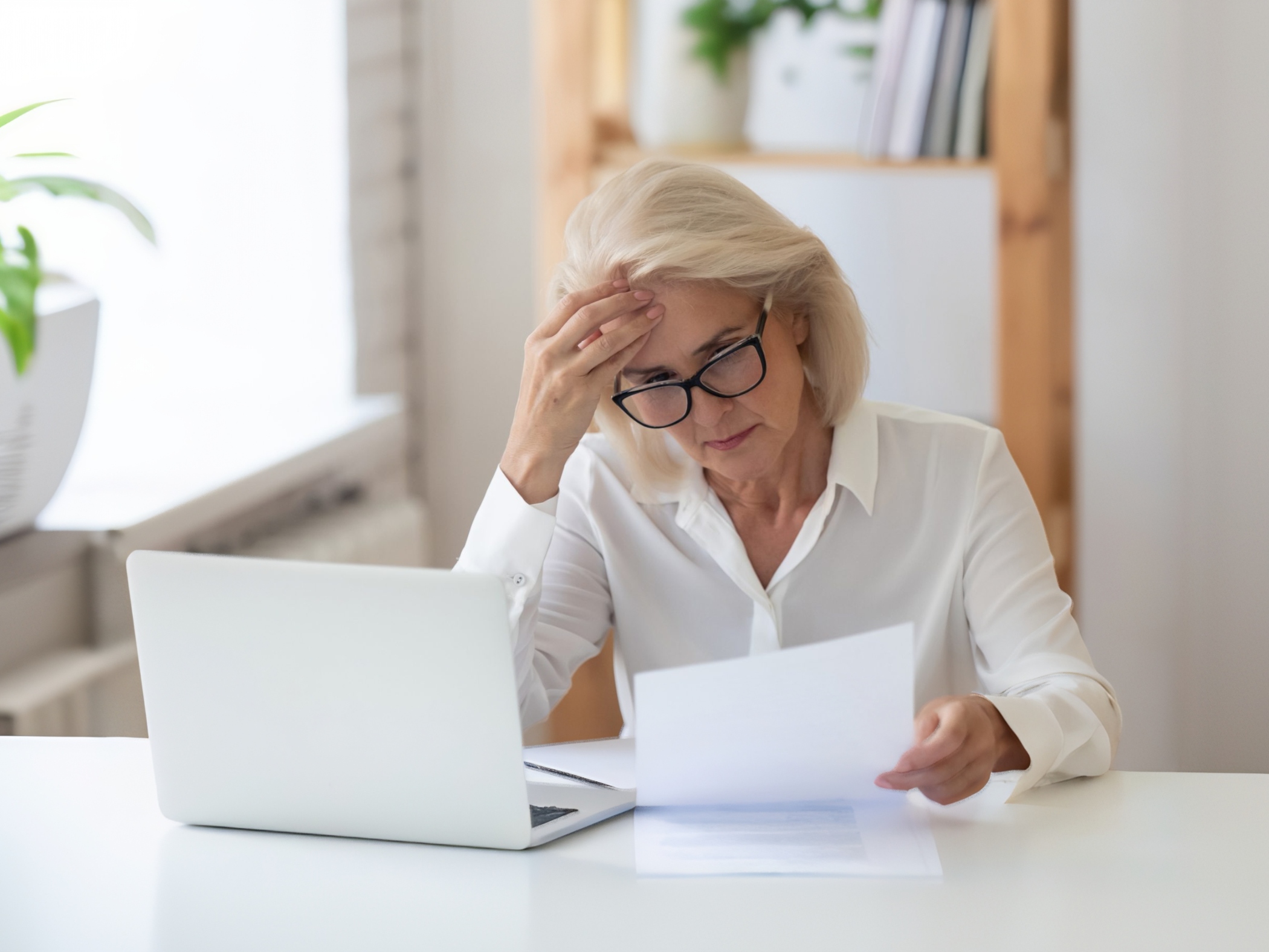Businesswoman looking a paperwork