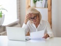 Businesswoman looking a paperwork