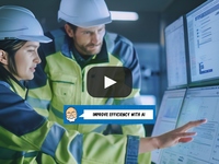 Industrial engineers looking at screen