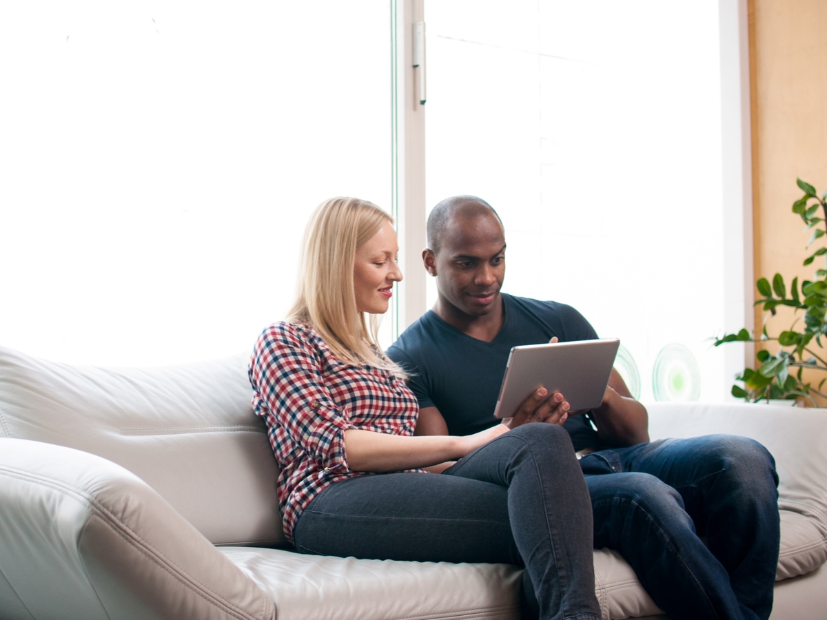 Couple using tablet