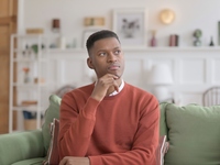 Man sitting on couch