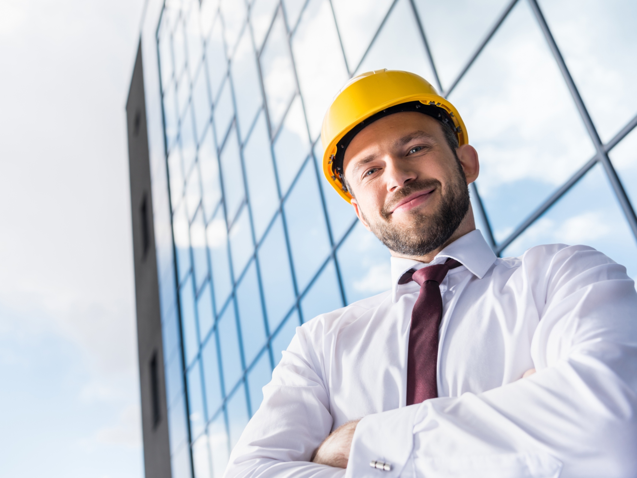Engineer in front of building