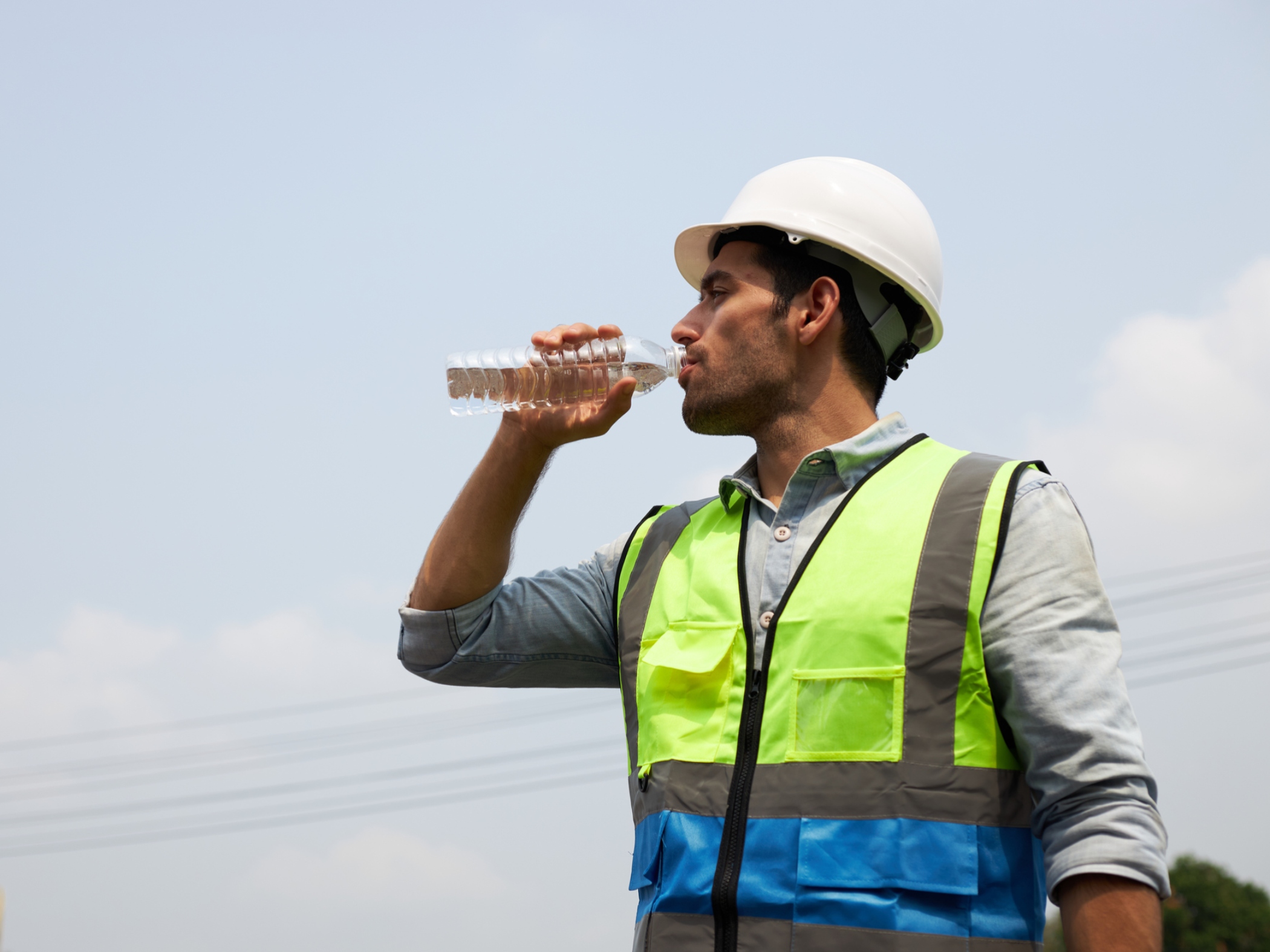 Outdoor worker drinking water