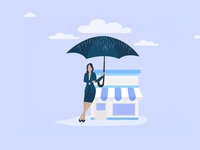 Businesswoman holding umbrella