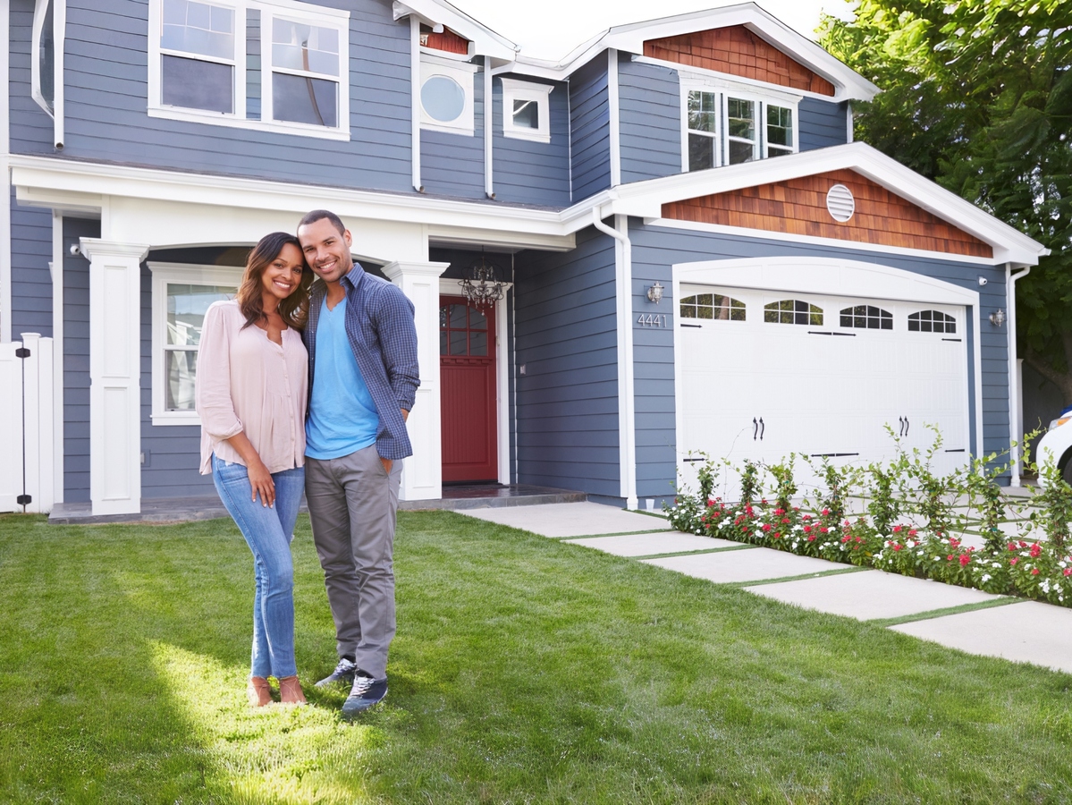 Couple outside of house